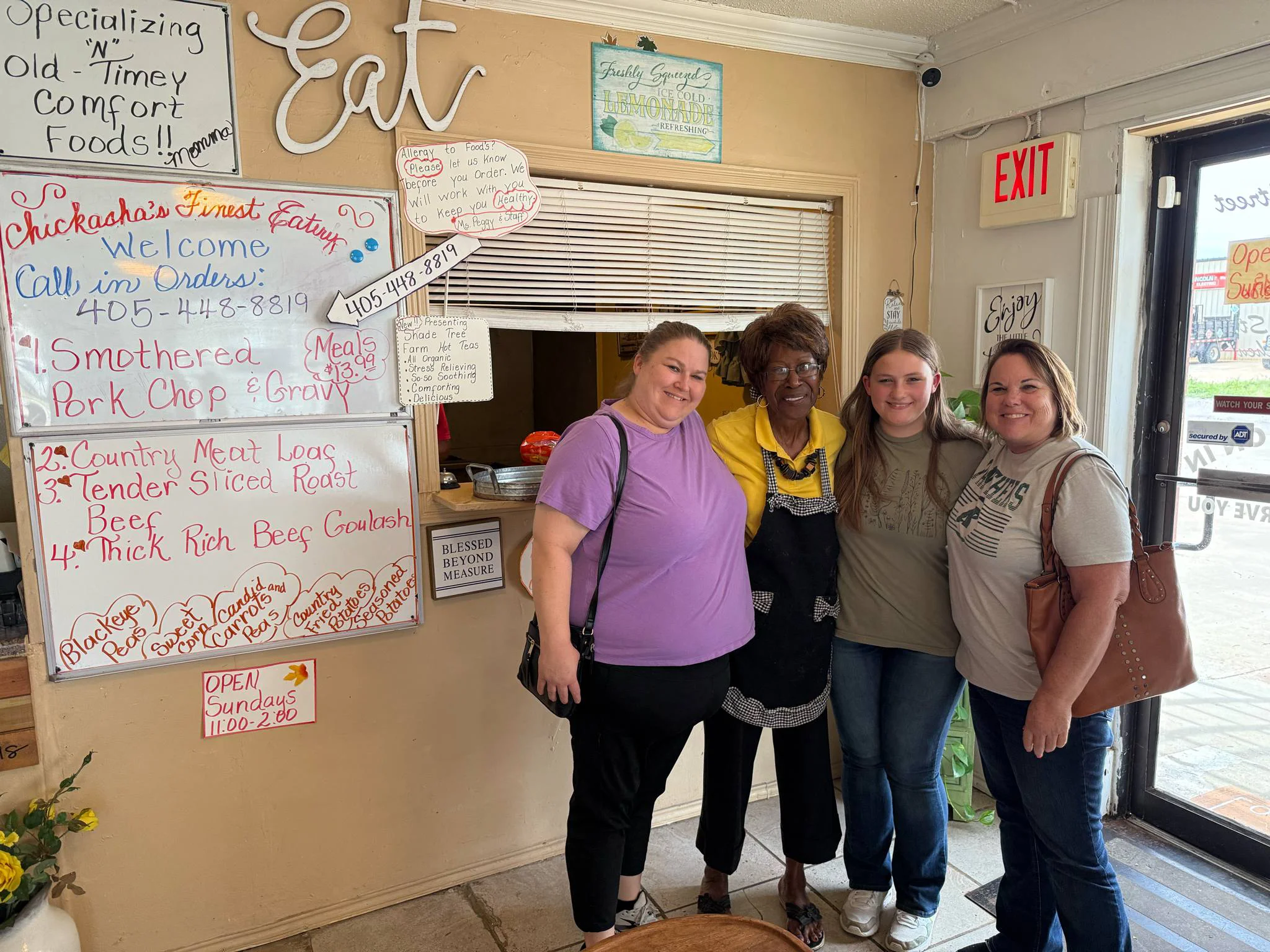 Miss Peggy with happy customers
